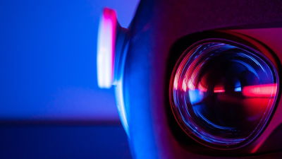 Close up of a VR headset against a blue background
