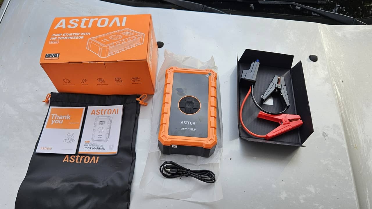 AstroAI S8 Jump Starter with accessories.