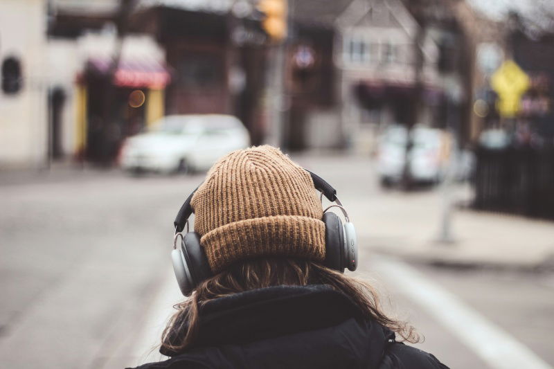 Listening to music on the street.
