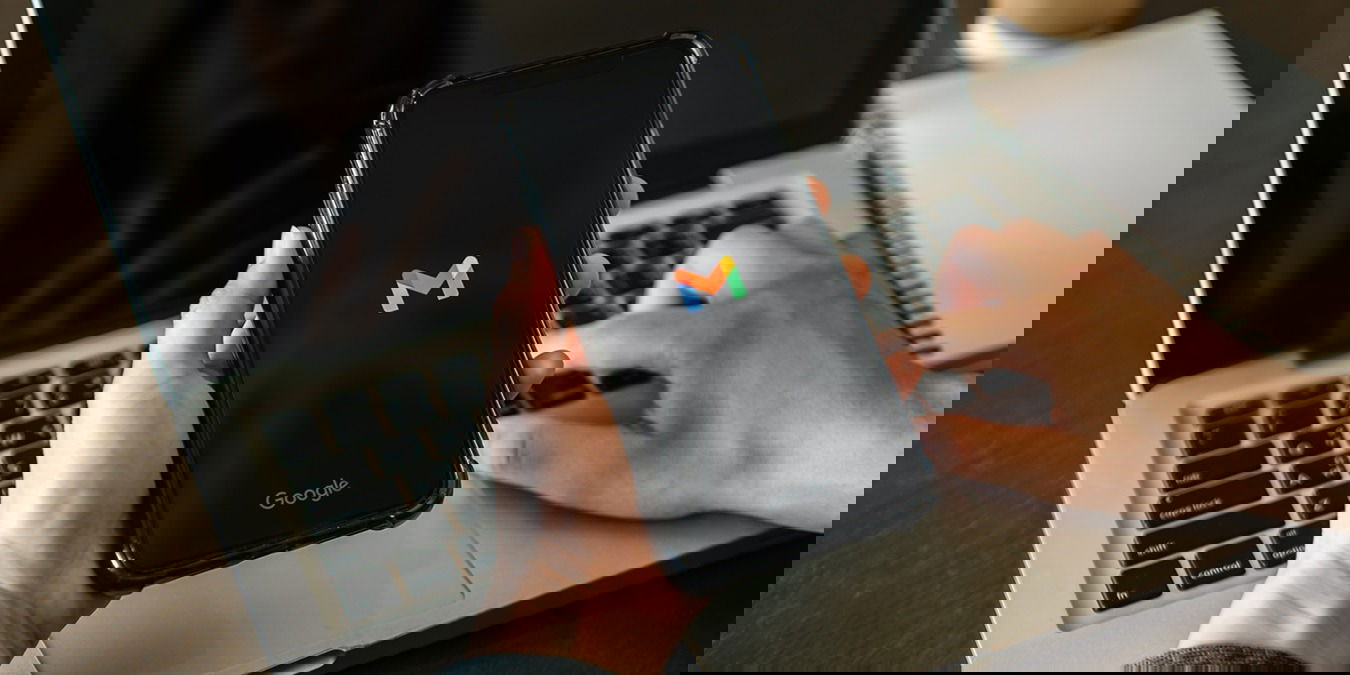 March 08, 2022: Hand Holding A Smartphone With Gmail App On The