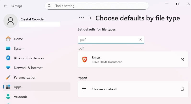 Changing app defaults in Windows settings.