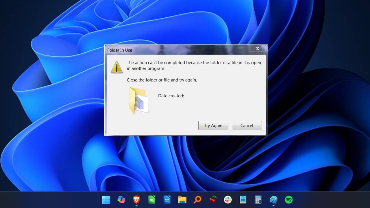 File is open in another program error message on Windows desktop.