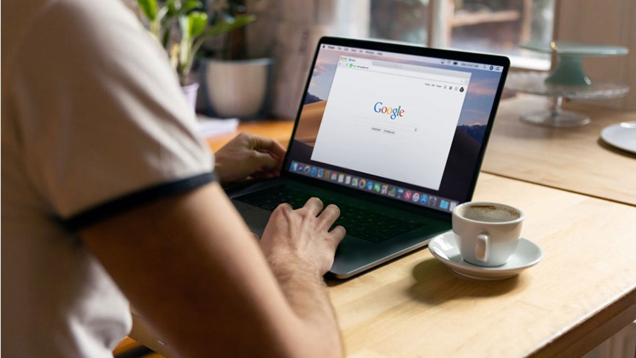 Person using Google on their laptop.