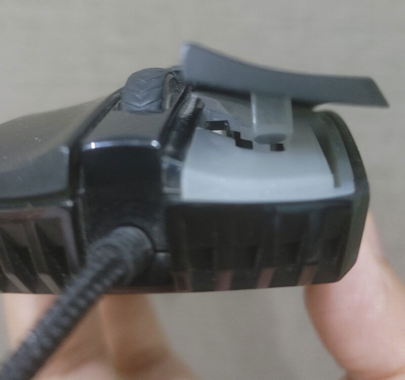 Mouse with button cap open