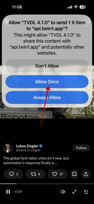 Giving permission for the X video downloading shortcut to run on iPhone. 